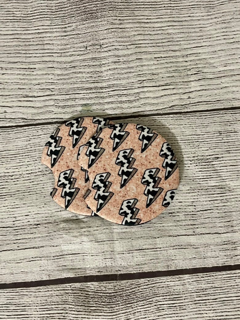 Lightening Bolt Cow Print Car Coasters